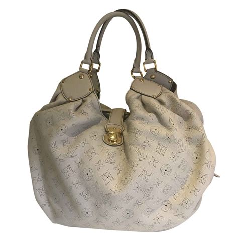 louis vuitton cream and grey bag|Louis Vuitton mahina bag.